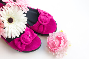 Elegant pink women's sandals. Women's shoes on a white background