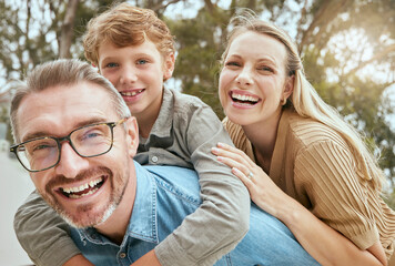 Parents, child and piggyback with portrait outdoor for playful game, bonding and support of love in backyard. Smile, family and boy with trust, security and care from mom and dad with hug together