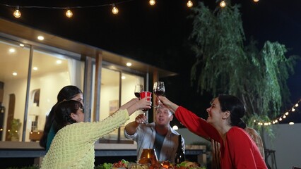 Family together for holiday celebration. Adult member hold grape wine in glass except daughter. Outdoor camping activity relax with food and spend time with relatives cross generation gap. Divergence.