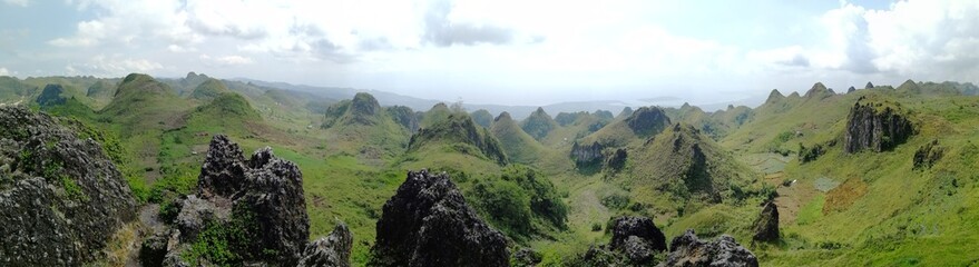 Naklejka premium The Chocolate Hills, a geological formation in Bohol, Philippines, panorama landscape view. 