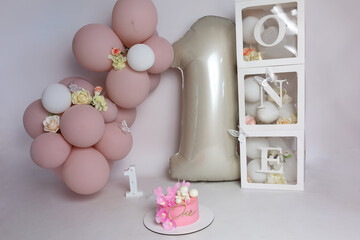 First birthday. Birthday decoration balloons and cubes. Copy space.