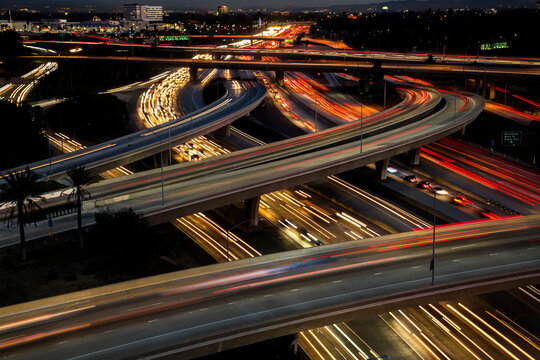 Above view of traffic at night on busy freeway interchange. The shot is of the 57 freeway in orange county Ca