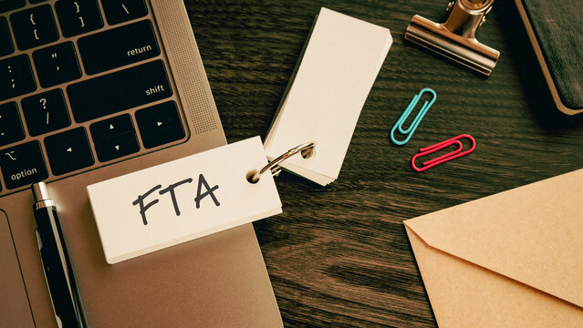 There is word card with the word FTA. It is an abbreviation for Free Trade Agreement as eye-catching image.