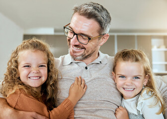 Portrait, girls and dad in lounge, smile and bonding with twins with hug in house, love and happy. Living room, kids and father with embrace for care, childhood and children with parent in apartment