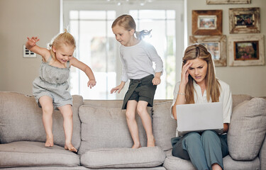 Children, playing and mother with stress or laptop on sofa with chaos, noise and frustrated with...
