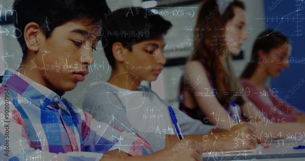 Wall mural Image of math formulas moving over class of diverse pupils learning at school