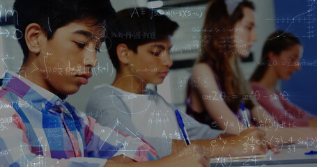 Image of math formulas moving over class of diverse pupils learning at school