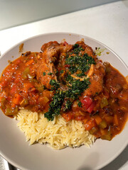 Oxtail with tomato sauce and risoni pasta.