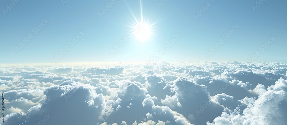 Poster A large expanse of sky filled with fluffy clouds the sun gently shining in the background providing a serene copy space image