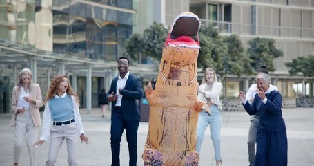 People, mascot or dance in team building activity as playful, funny or comedy in city plaza. Group of corporate workers, happy or comic as united, flash mob or pride of solidarity in bonding together