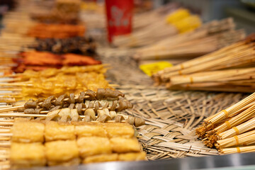Colorful Variety of Grilled Skewers at a Street Food Market