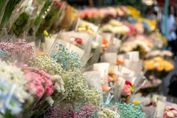 Vibrant Floral Display at a Busy Flower Market