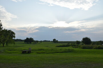 Fototapeta premium Clouds Over a Rural Farm Field