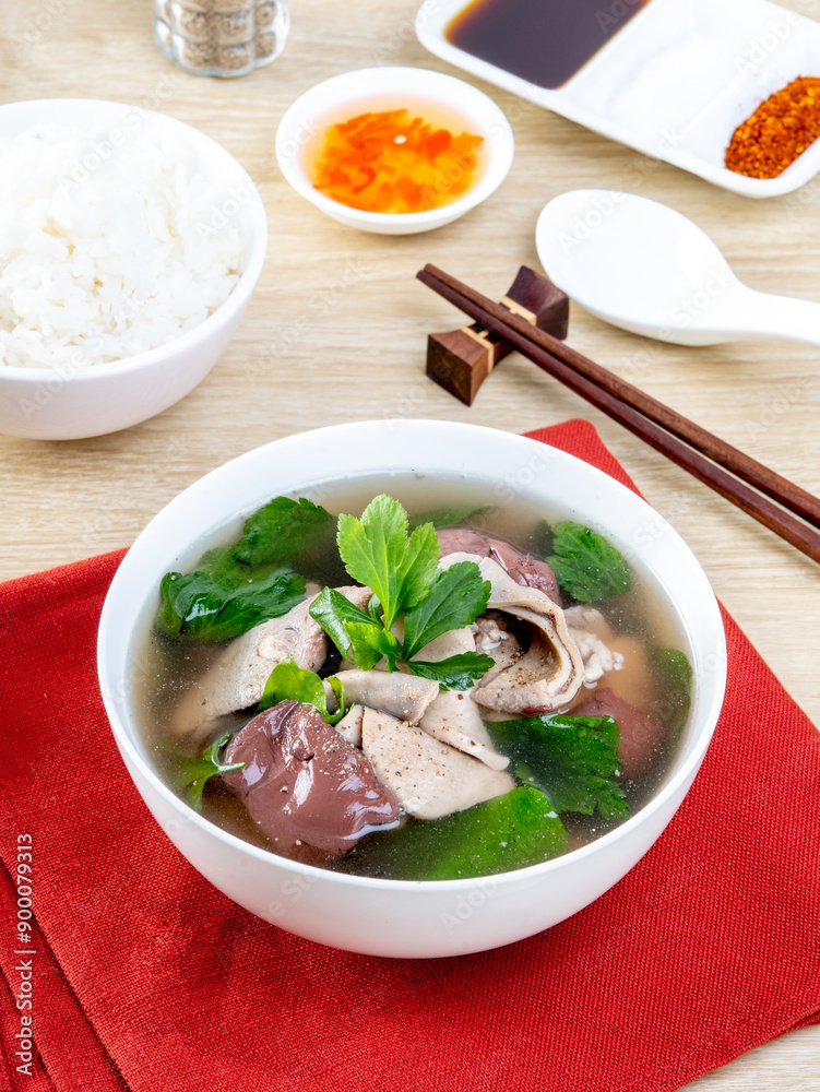 Canvas Prints Pork Blood Soup In a white bowl on a wooden table