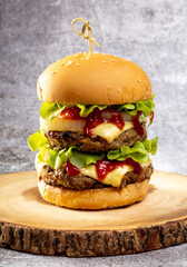 fresh tasty double hamburger on the table