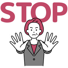 両手を前に出してSTOPと言う中年のスーツの女性