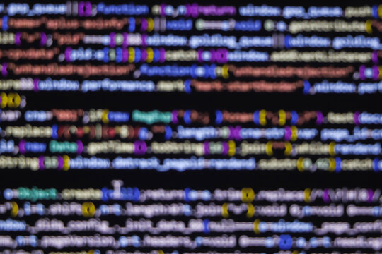 Blurry unfocused programming coding screen, web developer coding screen