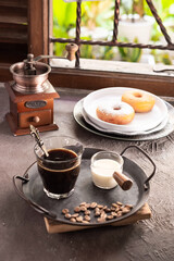 cup of coffee and donuts