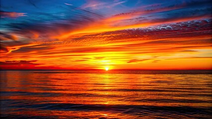 Vibrant sunset casting warm hues over calm sea with silhouetted horizon, sunset, sea, ocean, horizon, sky, clouds, reflection
