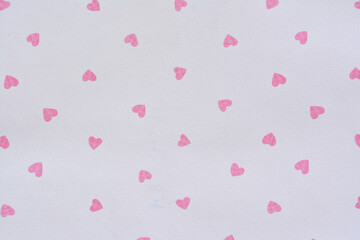 Close-up wallpaper of pink heart shape on white background.