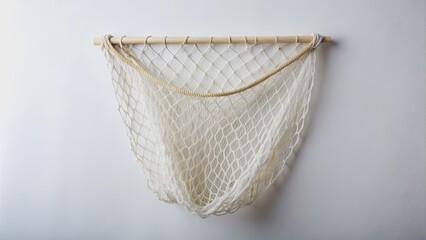 Obraz premium A white background stock photo of a laundry net used to wash knitted woolen clothing, laundry, net, wool, knitted, clothing