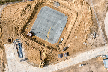 foundation construction of new building. builders install reinforcement steel for concrete. aerial...