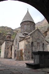 The image captures the stunning medieval Haghpat Monastery in Armenia, a masterpiece of...
