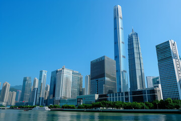 Fototapeta premium Skyscrapers Viewed from Below with Blue Sky and White Clouds