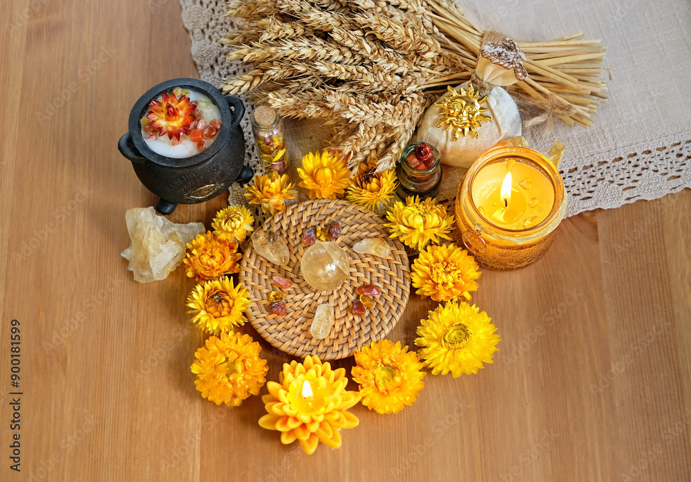 Wall mural wiccan altar for lammas, lughnasadh. amulets, flowers, candles, witchcraft items, wheat ears and cry