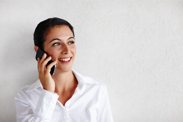 Phone call, discussion and business woman in office for contact, schedule meeting or project feedback. Mockup, professional and person for negotiation, networking or talking to client at media agency