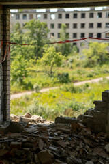 View of an abandoned building from a room