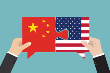 Bilateral political relations and cooperation between USA and China. Business people hands connect puzzle pieces with flags after business deal. Countries partnership concept