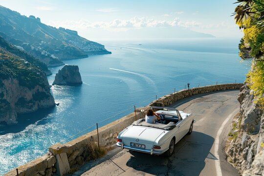 A scenic drive along the Amalfi Coast, with a couple in a convertible, coastal cliffs, and the sparkling Mediterranean Sea