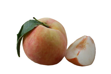 Ripe white peach with leaves and half slices on white background.