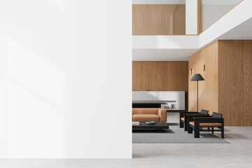 Cozy living room interior with sofa and armchairs, shelf and mockup wall