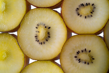 Golden kiwi fruit background