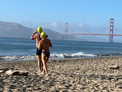 person running on the beach