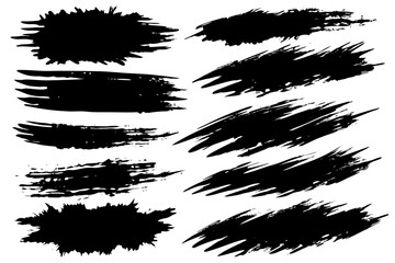 A collection of black paint marks on a white surface