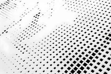 A white background with small black squares arranged in an orderly pattern, creating the appearance of data points or digital code. The square dots form the grid for various text and images to be plac