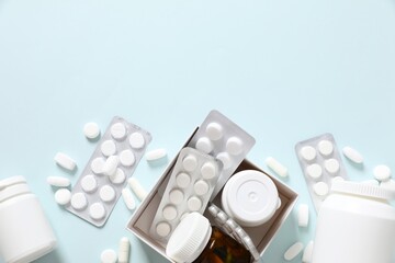 Different pills on a color background