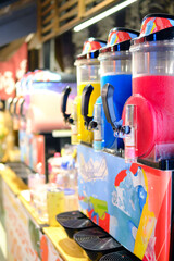 Colorful slush machine with blurred background