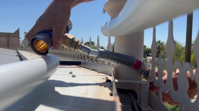 INSERTING THE FITTING INTO THE 20 MULTILAYER