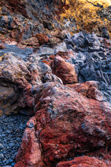 Colourful detail of Djupalonssandur beach on the Snaefellsnes peninsula in winter in Iceland