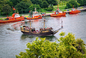 Fototapeta premium Beautiful vintage recreational sail ship in the port of Gdansk. Aerial view
