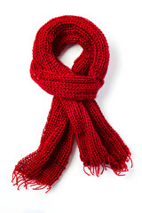 Red knitted scarf on a white background.