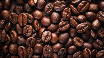 Fototapeta premium Overhead view of backdrop representing halves of dark brown coffee beans with pleasant scent