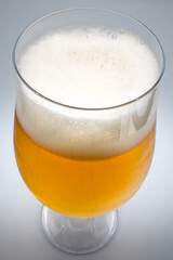 Glass of beer on a white background.
