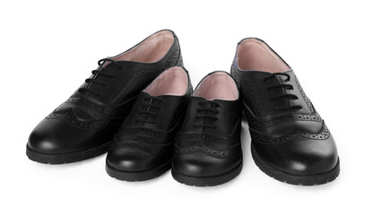 Big and small shoes isolated on white