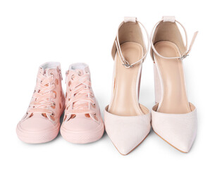 Big and small shoes isolated on white