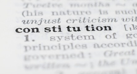 Fototapeta premium Constitution definition in the dictionary close-up, shallow depth of field and selective focus.